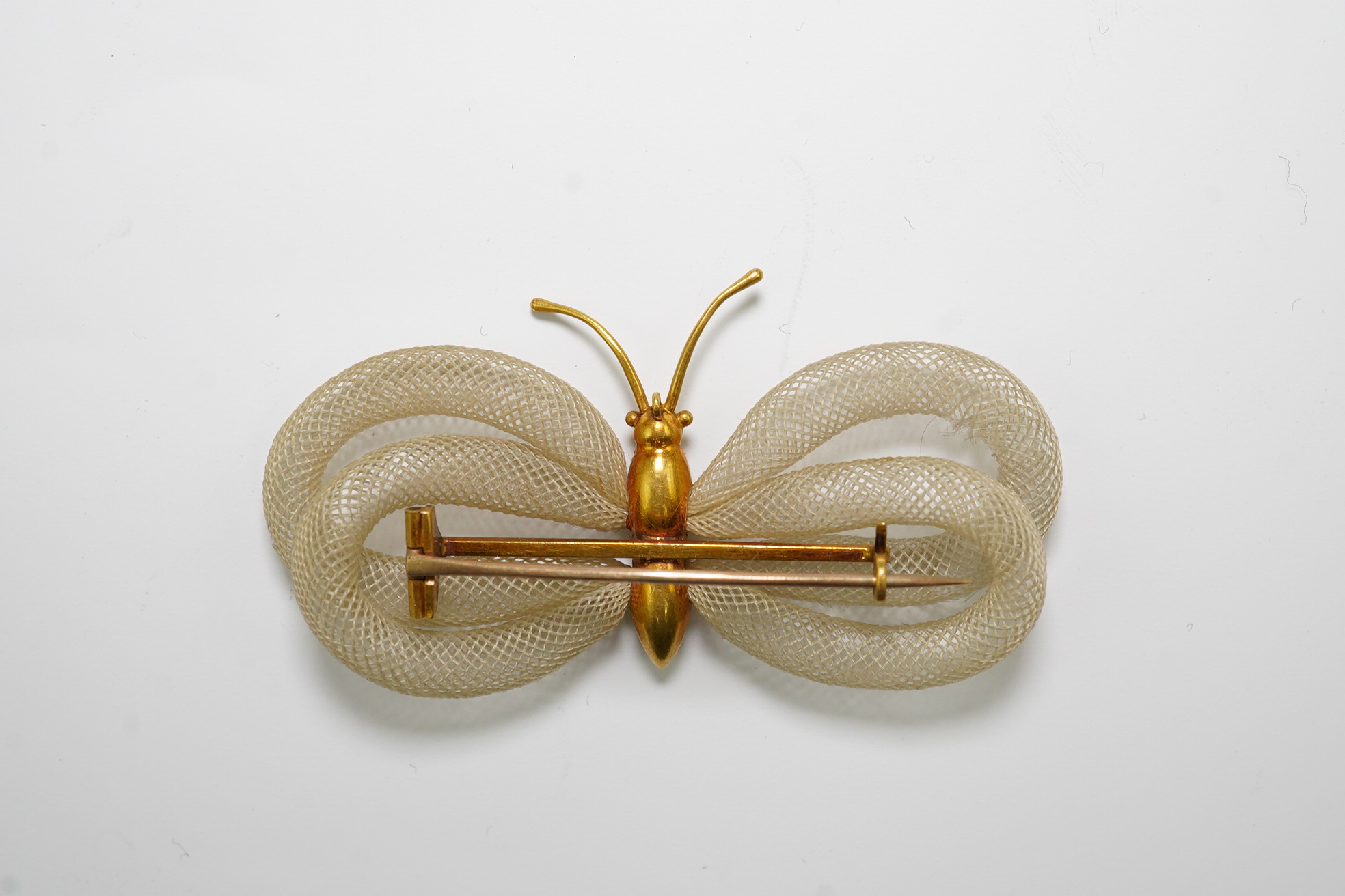 Antoni Forrer (1802/3-1889), 'Artiste en Cheveux', 136 Regent Street, London. A pair of gold mounted hairwork drop earrings and a butterfly brooch